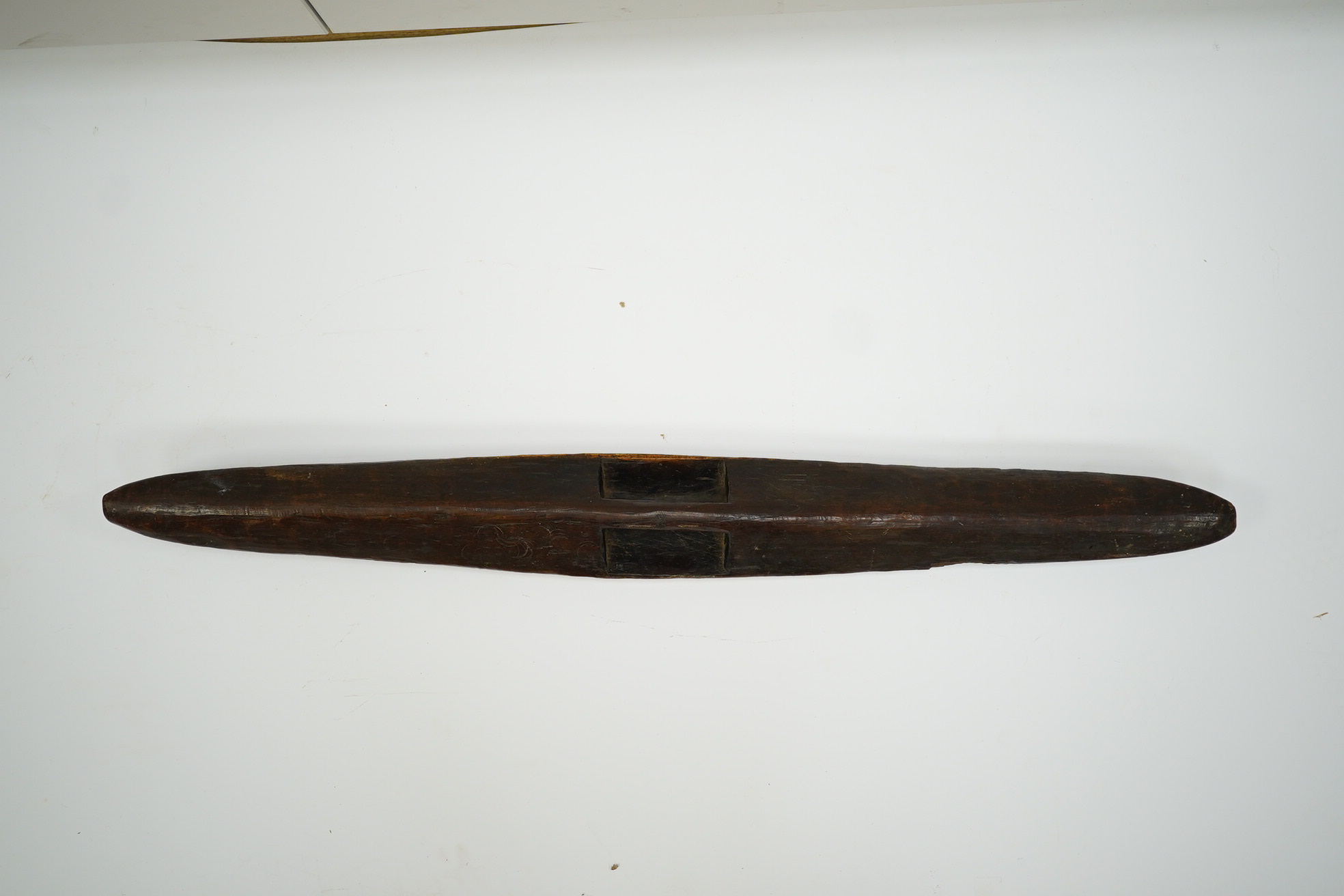 An Aboriginal carved hardwood parrying shield, 80cm. Condition - fair